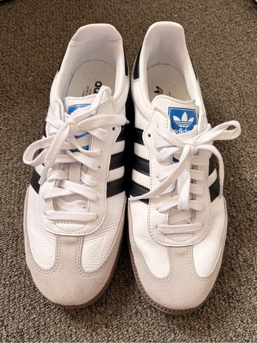 Black, white, and grey Adidas Gazelles